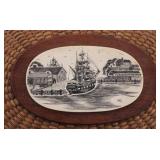 Scrimshaw on top of purse sign "UG" 