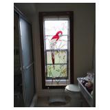 large stained glass bird