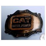 https://www.ebay.com/itm/124143286943	AB0007 USED VINTAGE CAT DIESEL POWER BRONZE BELT BUCKLE $10.00
