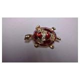 https://www.ebay.com/itm/114171609807	BOX074G: COSTUME JEWELRY RED & GOLD TONED TURTLE PIN $5.00