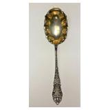 https://www.ebay.com/itm/124835396032	ME1023 STERLING SILVER SERVING SPOON WITH CURLED EDGES