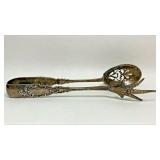 https://www.ebay.com/itm/114918154937	ME1028 STERLING SILVER ORNATE TONGS WITH E.H. INITIALS AND BIR