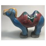 https://www.ebay.com/itm/124835396055	ME7006 South African Raku Pottery Camel Figurine (blue and yel