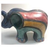 https://www.ebay.com/itm/114918154978	ME7010 South African Raku Pottery Elephant Figurine (dark blue