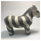 https://www.ebay.com/itm/114918154991	ME7021 South African Raku Pottery Zebra Figurine (small)
