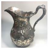 https://www.ebay.com/itm/114902643909	ME7040 Sterling silver T. Hausmann & Sons Grape Vine Pitcher (