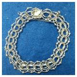 https://www.ebay.com/itm/115123975819	LAN3427 VINTAGE 7 INCH STERLING SILVER ELCO CHARM BRACELET (18