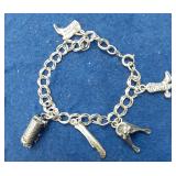 https://www.ebay.com/itm/115128372286	LAN3430 VINTAGE 7 INCH STERLING SILVER CHARM BRACELET WITH CHA