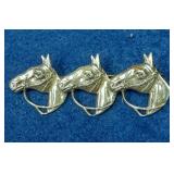 https://www.ebay.com/itm/115128437219	LAN3446A VINTAGE STERLING  SILVER  HORSES HEAD PIN BROOCH  (4.