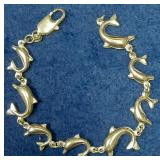https://www.ebay.com/itm/125036837338	LAN3453 VINTAGE 7 INCH STERLING SILVER DOLPHIN BRACELET (9.4 G