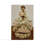 https://www.ebay.com/itm/115379244314	JK3003 VINTAGE 7 INCH GERMAN Porclain SITTING LADY FIGURINE		B