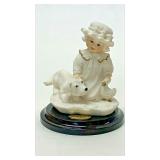 https://www.ebay.com/itm/125331204605	LB1037 COLLECTIBLE G. ARMANI CHILD WITH DOG "PUPPY LOVE" FIGUR