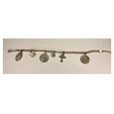 https://www.ebay.com/itm/115399259448	NC604 STERLING SILVER RELIGIOUS BRACELET CROSSES AND SAINTS		A