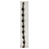 https://www.ebay.com/itm/125335740819	NC607 STERLING SILVER BRACELET WITH ONYX BLACK BEZELED STONES 