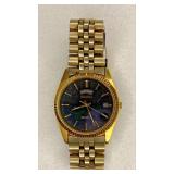 https://www.ebay.com/itm/115415671826	NC626 SEIKO WATCH GOLD AND BLACK WITH DAY AND DATE, UNTESTED		