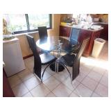 Glass table and 4 chairs $75.00