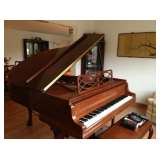 Steinway & Sons 2000/2001 Model M Grand Piano with matching bench.