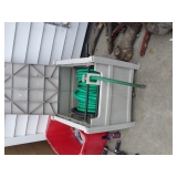 LAWN HOSE IN HOLDER