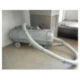 An Electrolux vacuum with attachments