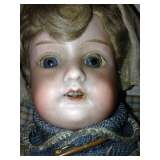 Antique Doll has teeth