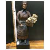 Peasant Woman Selling Pretzels Figurine
