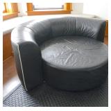 Circular Blk. leather sofa