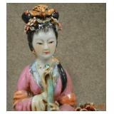 Geisha girl with flute