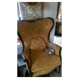 Carved wingback chair