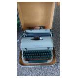 vintage typewriter in case