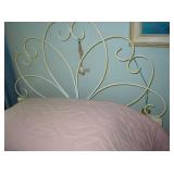 Two matching wrough iron bed frames