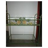 wrought iron cart has matching chairs