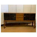 Mitchell Litt Sideboard Cabinet With Brass Ring Hardware And Subtle Cherry Blossom Motif.