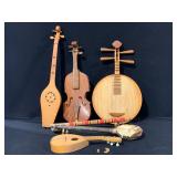 Primitive Grouping Of Wooden Instruments.