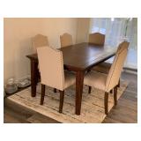 Jofran Seven Piece Dining Set With Six Upholstered Chairs With Nail Head Trim.
