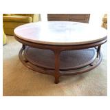 Vintage Travertine Top Cocktail Table On Wood Frame With Caned Bottom.