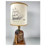 hip Themed Lamp On Vintage Style Wooden Base With Cool Rope And Anchor Accents And A Printed Cream Shade.