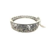 Hinged Sterling Silver Bangle Bracelet With Elephant Motif Covered In Dazzling Marcasites And Ruby Eyes.