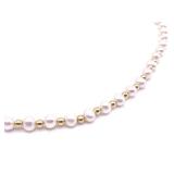 14k Gold Pearl Necklace, 18 Inches Long.