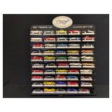 50 Years Of Corvette Display Shelf With Model Cars By The Danbury Mint. Please Note Models Go From 1953 To 2003 With A 1983 Model Car Missing.