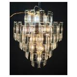 Brass Five Tier Chandelier.