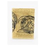 Yellow Postage Stamp with Black Cancellation Mark