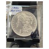 Large Silver-Tone Coin in Protective Sleeve