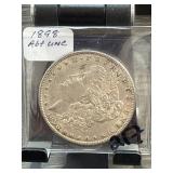 Large Metal Coin in Protective Sleeve
