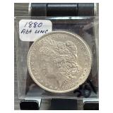 Large Metal Coin in Protective Sleeve
