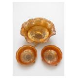 Three Iridescent Orange Glass Bowls