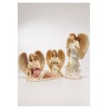 Three Porcelain Angel Figurines