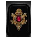 Gold-Tone Brooch With Red and Clear Stones