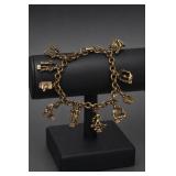 Gold-Tone Charm Bracelet With Animal and Object Charms