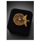 Gold-Tone Bird and Nest Brooch