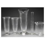 Five Graduated Glass Laboratory Vessels